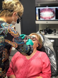 staff making model of patient's teeth